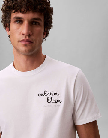 The Handwritten Cursive Chest Logo Tee